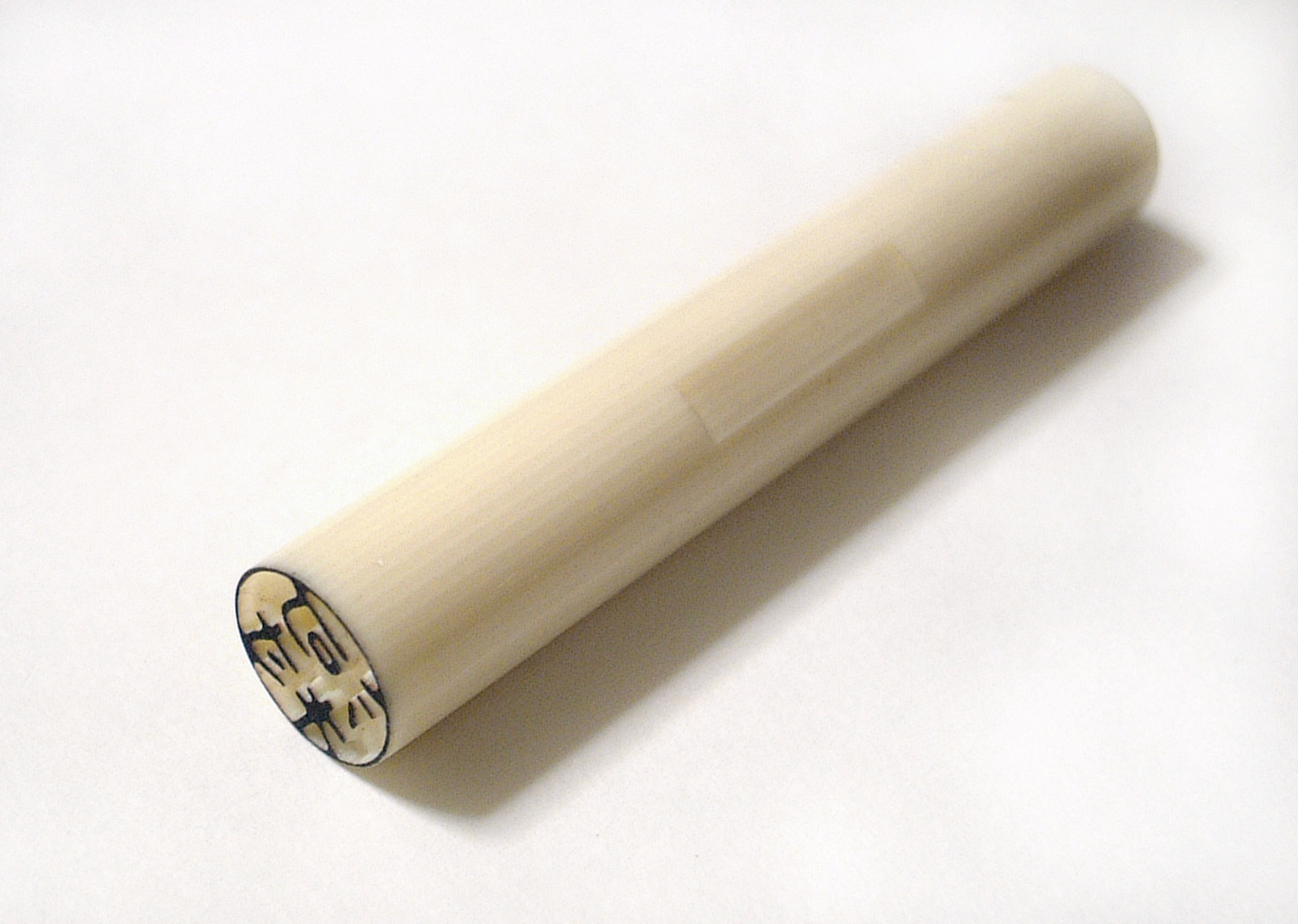 A Japanese hanko, a personal seal carved with characters, whose red-ink impression validates the ringisho as it circulates from manager to manager